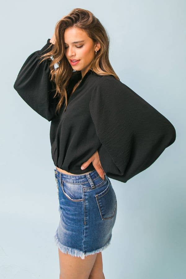 A solid woven top