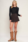 A solid woven brown skort