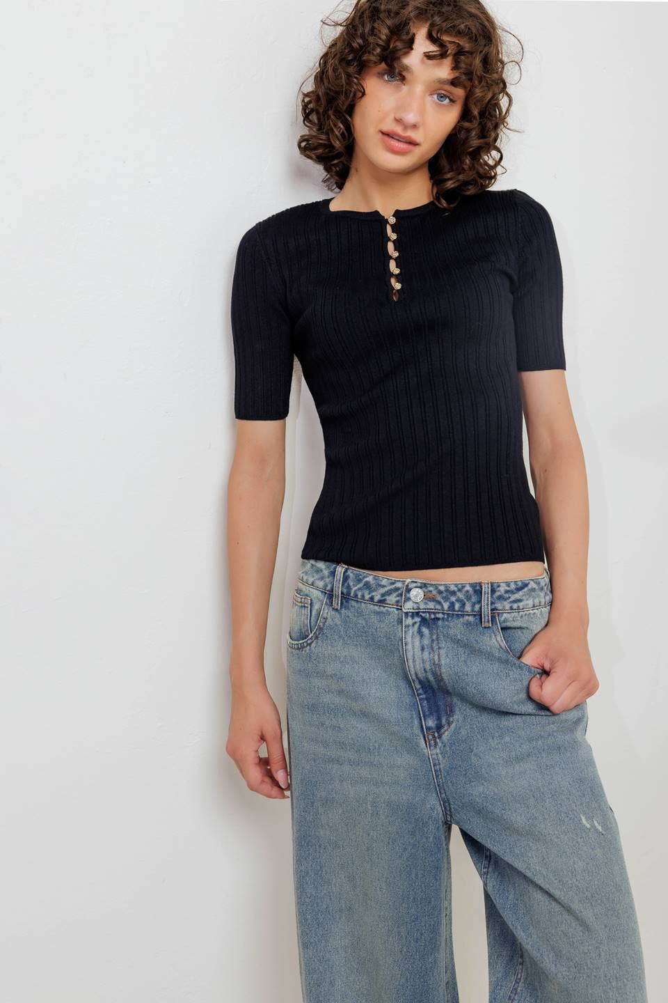 Black ribbed sweater knit top