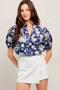 A printed blue & white woven top
