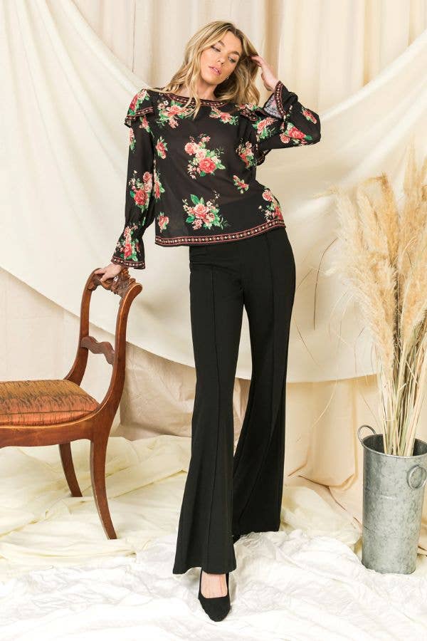 A WOVEN TOP