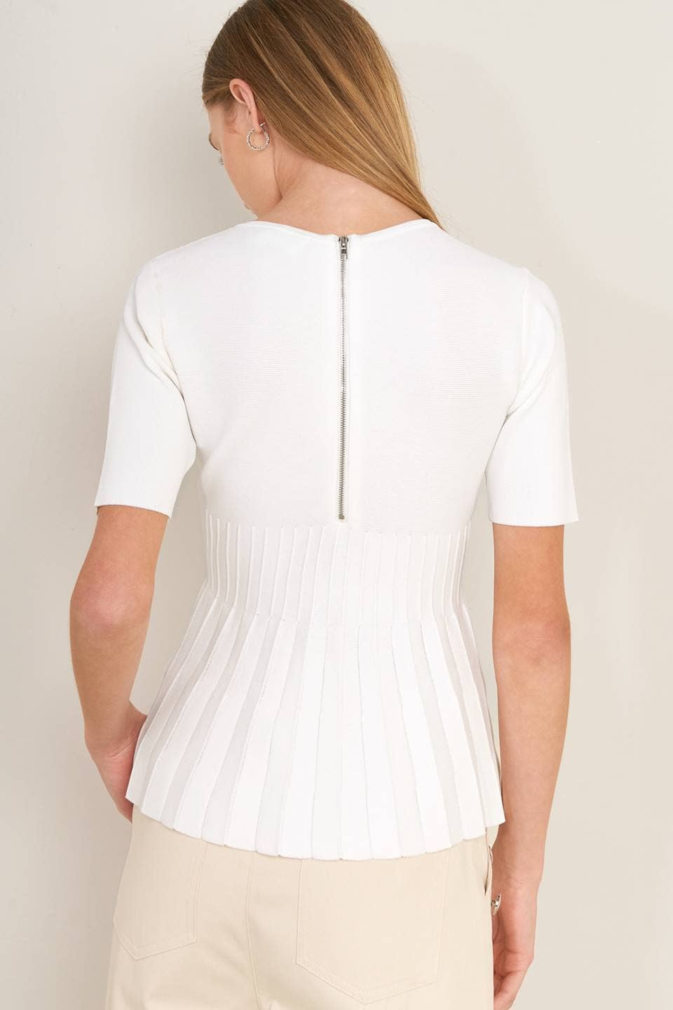 White sweater knit top