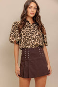 A cheetah woven top