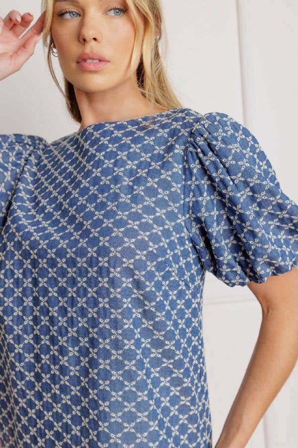 A textured blue woven top