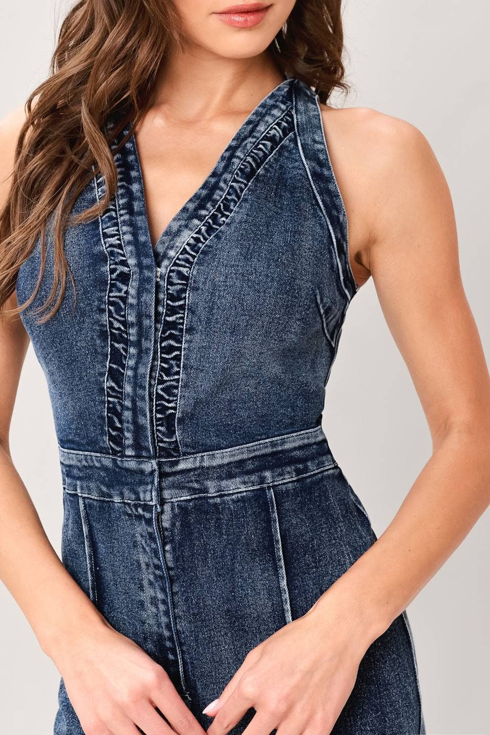 A washed denim jumpsuit