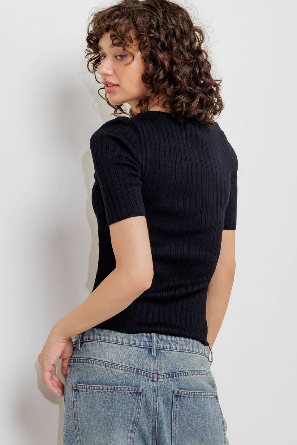 Black ribbed sweater knit top
