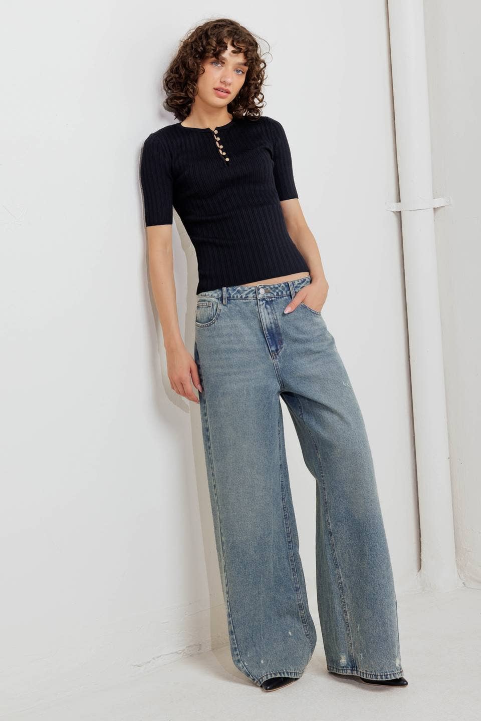 Black ribbed sweater knit top