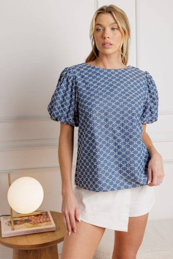 A textured blue woven top