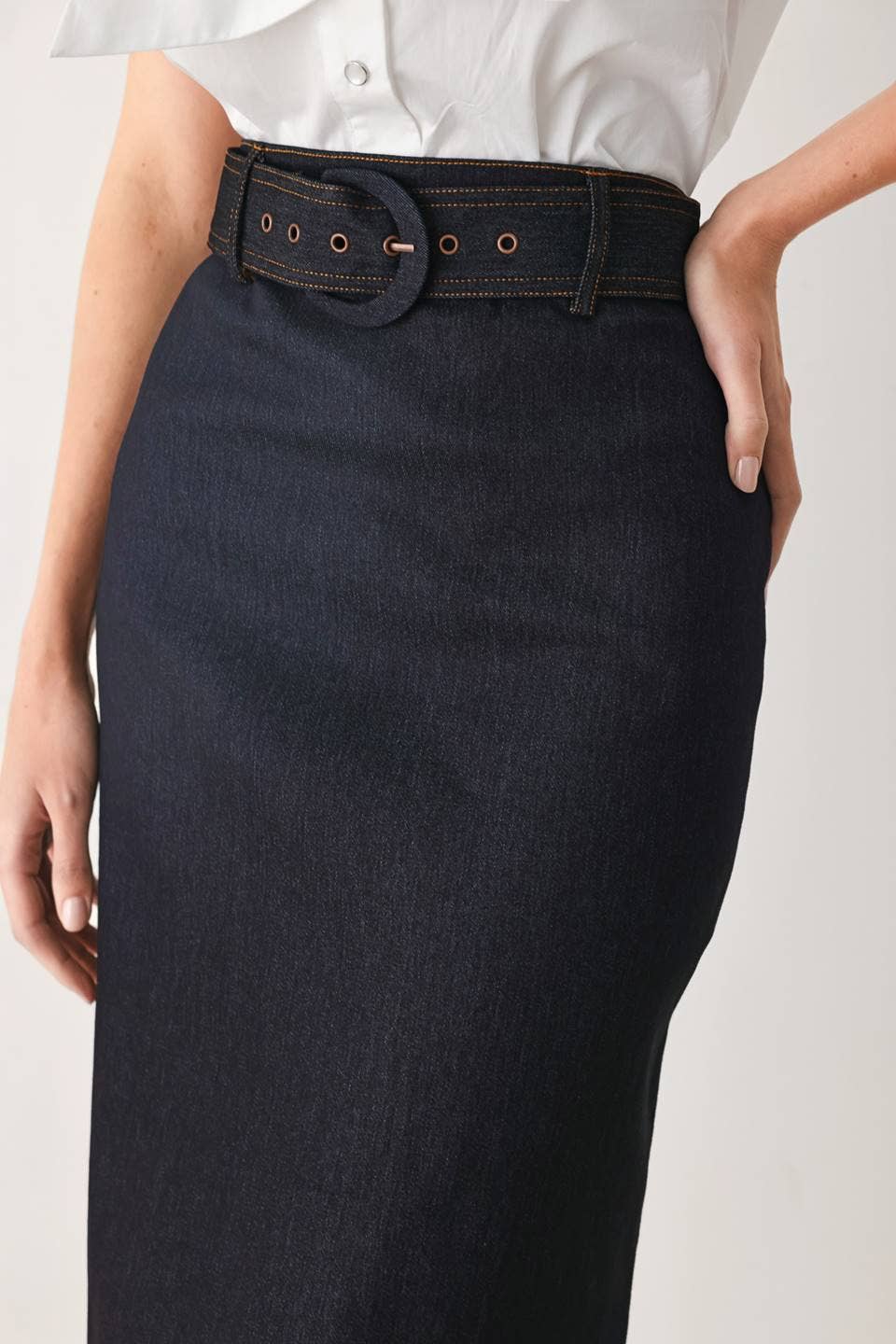 A denim mini pencil skirt
