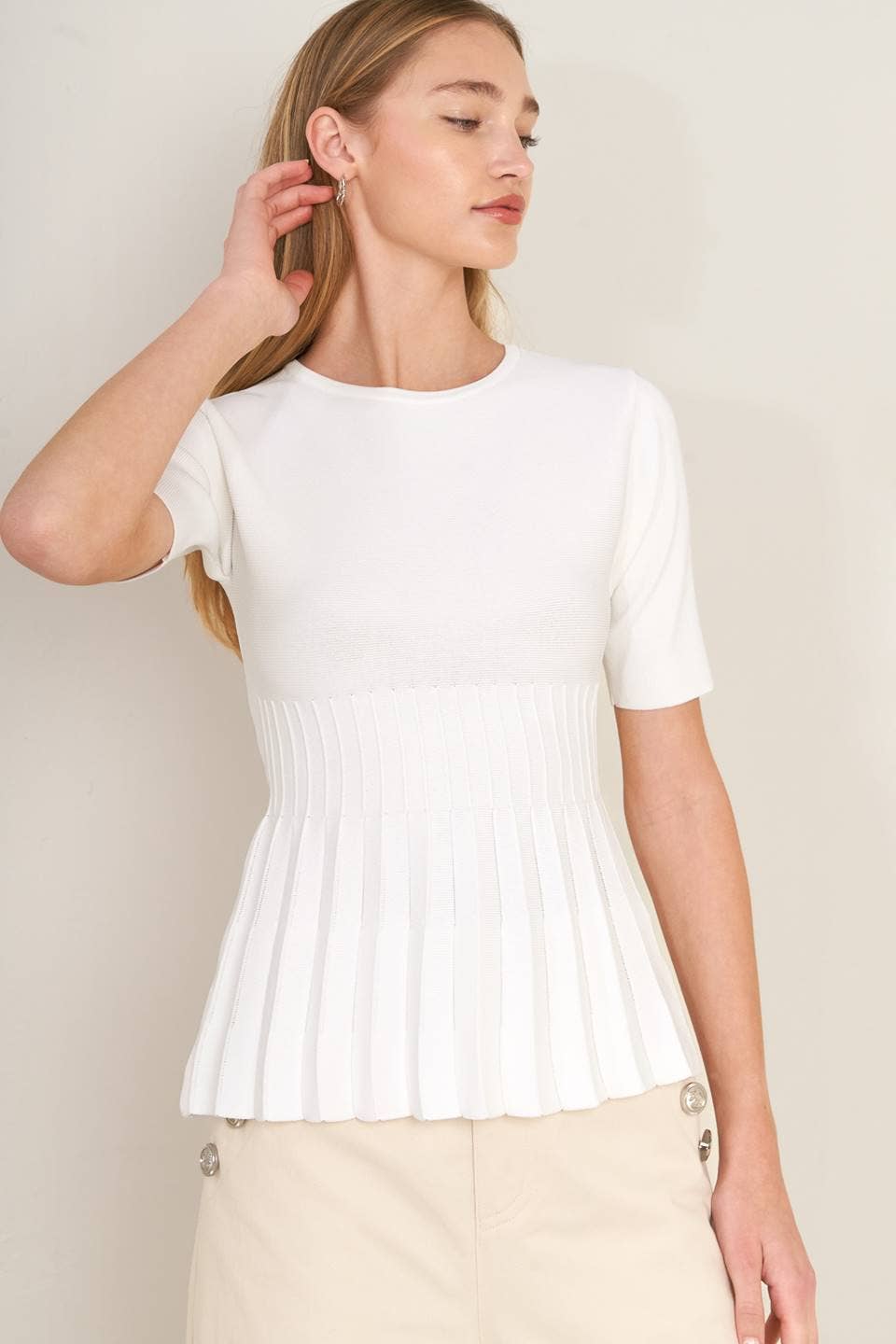 White sweater knit top